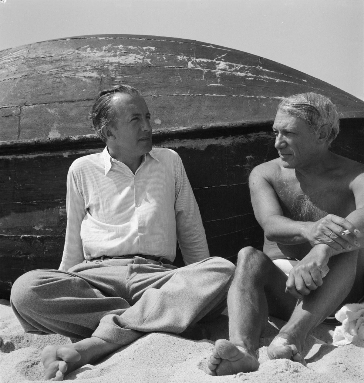 Photograph of Paul Eluard and Pablo Picasso on the beach Sep 1937 Eileen Agar 1899-1991 Presented to Tate Archive by Eileen Agar in 1989 and transferred from the photograph collection in 2012.